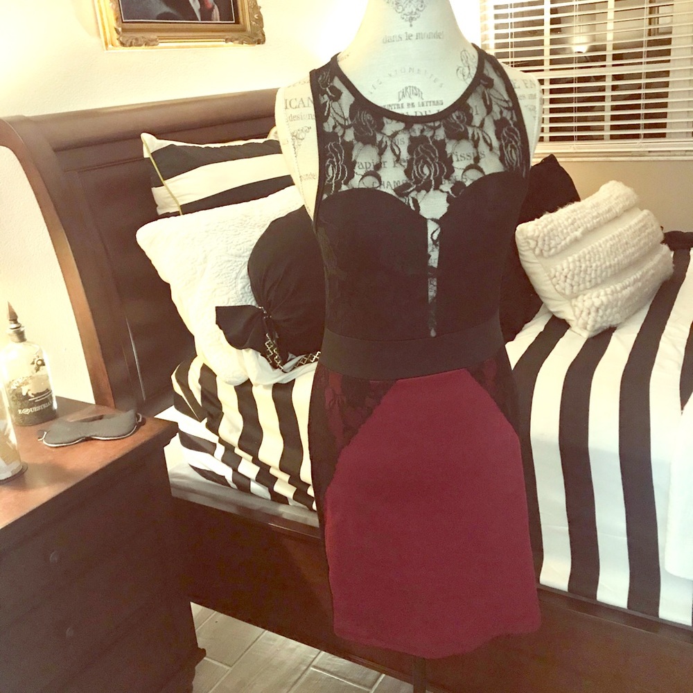 Medium black lace and darker red dress